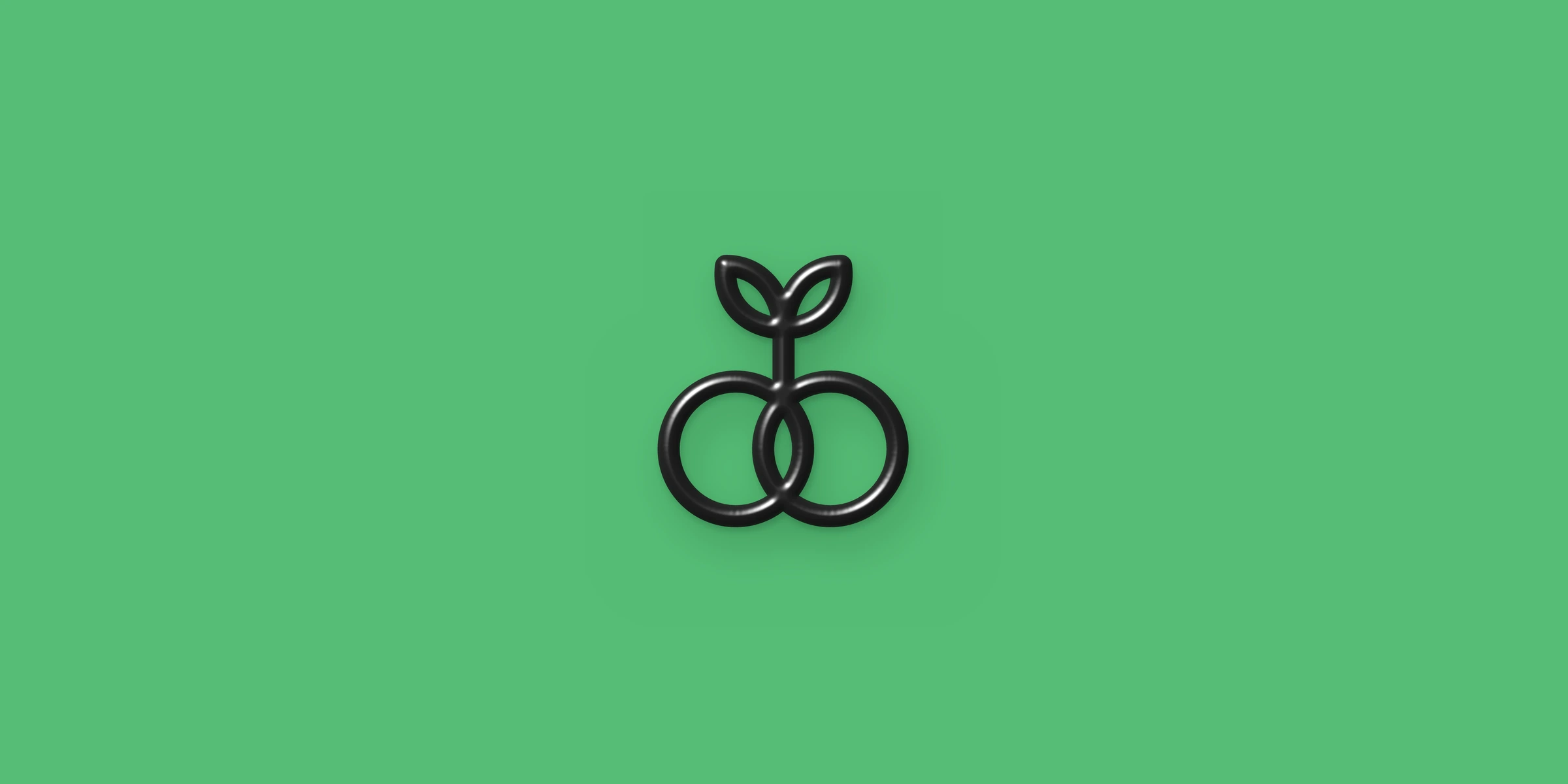 The vegansexual symbol, two interlocking circles beneath a single sprout, as a glossy black 3D object on green